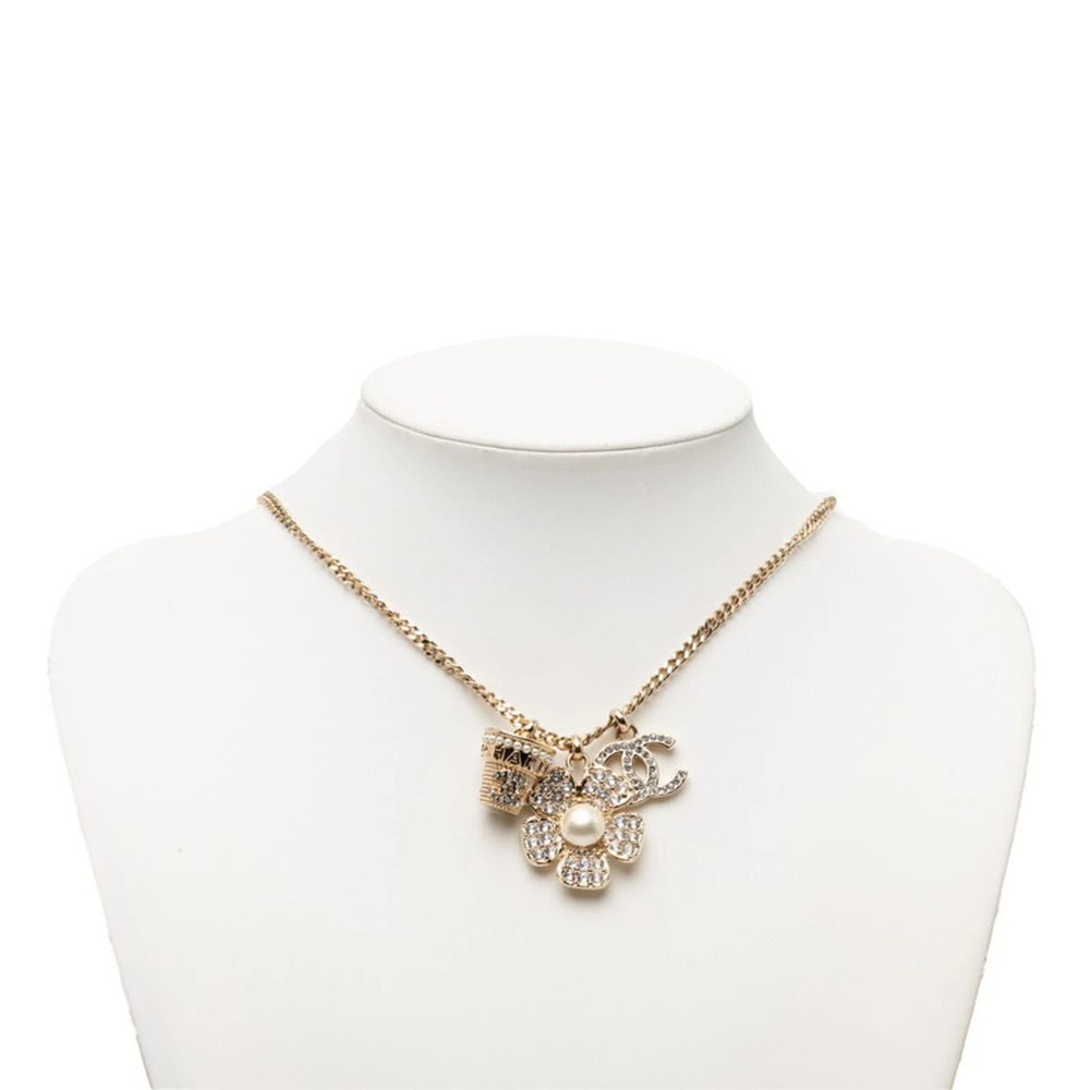CHANEL Gold Pearl Logo Necklace - Picture 4 of 5